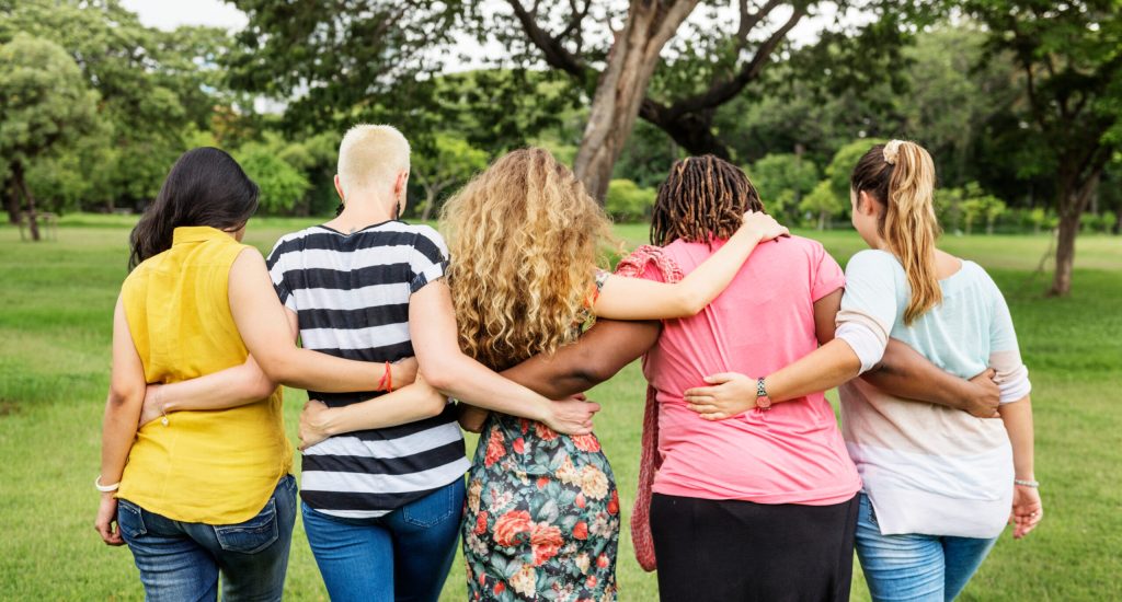 Friends having fun in park